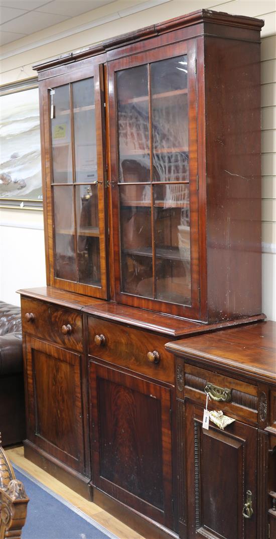 Two wings from a mahogany library bookcase, each W.73cm H.227cm